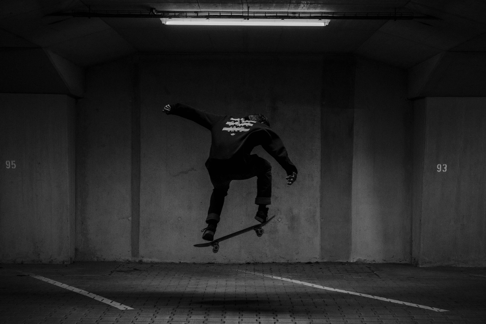 Skateboarder catching big air on an ollie